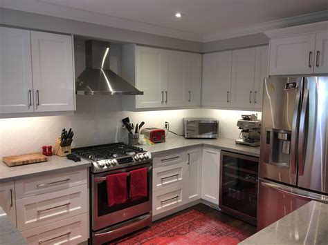 white or stainless steel appliances with white cabinets|mixing white and stainless appliances.